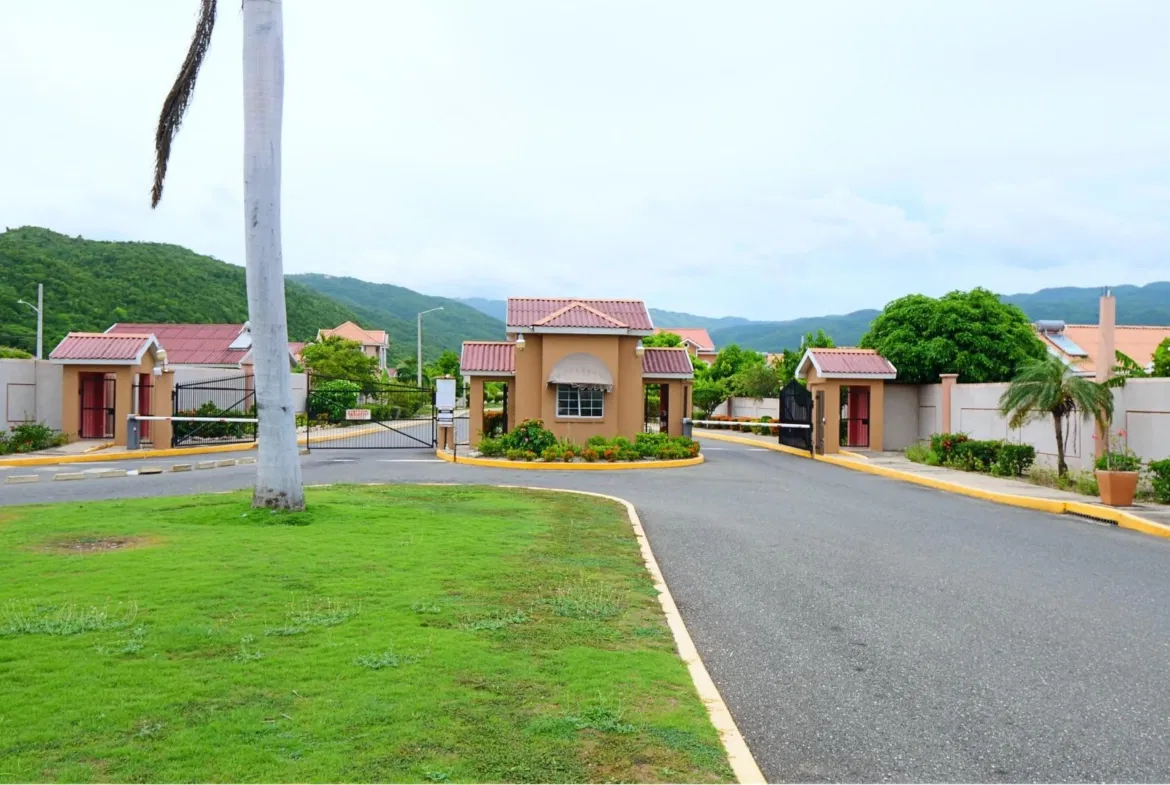 Main gate at Caymanas Country Club Estate